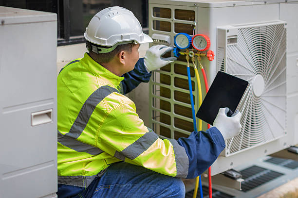 Professional Hvac technician working in Pasadena, MD